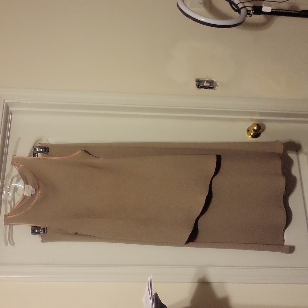 Short sleeve shirt with matching long skirt. Bright and white stripes,Will Smit